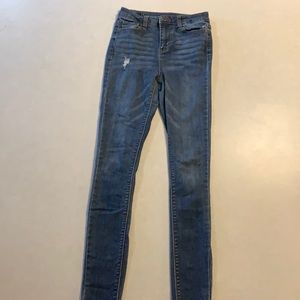 Dark wash denim jeans. Kinda ripped. From Belk.